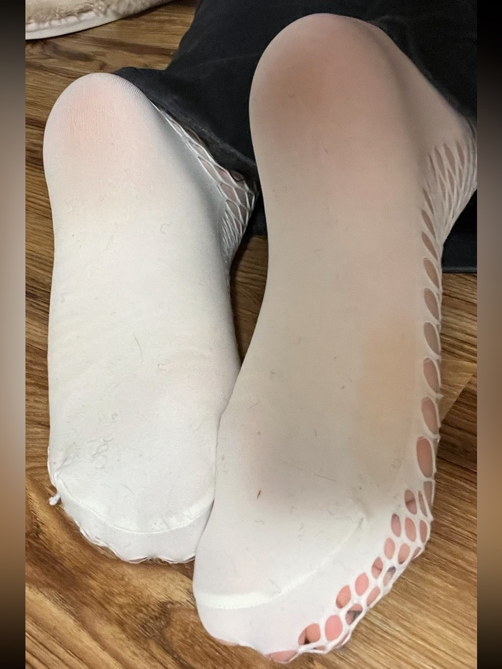 well worn white fishnet socks